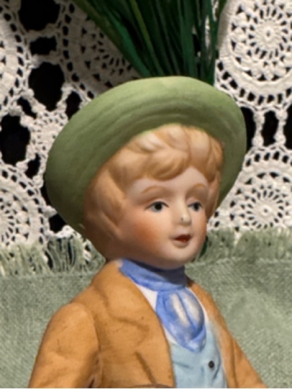 Porcelain-like Boy Figurine with A Goose - White and Pastel Colors